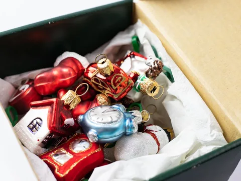 Christmas ornaments kept together inside a storage box.